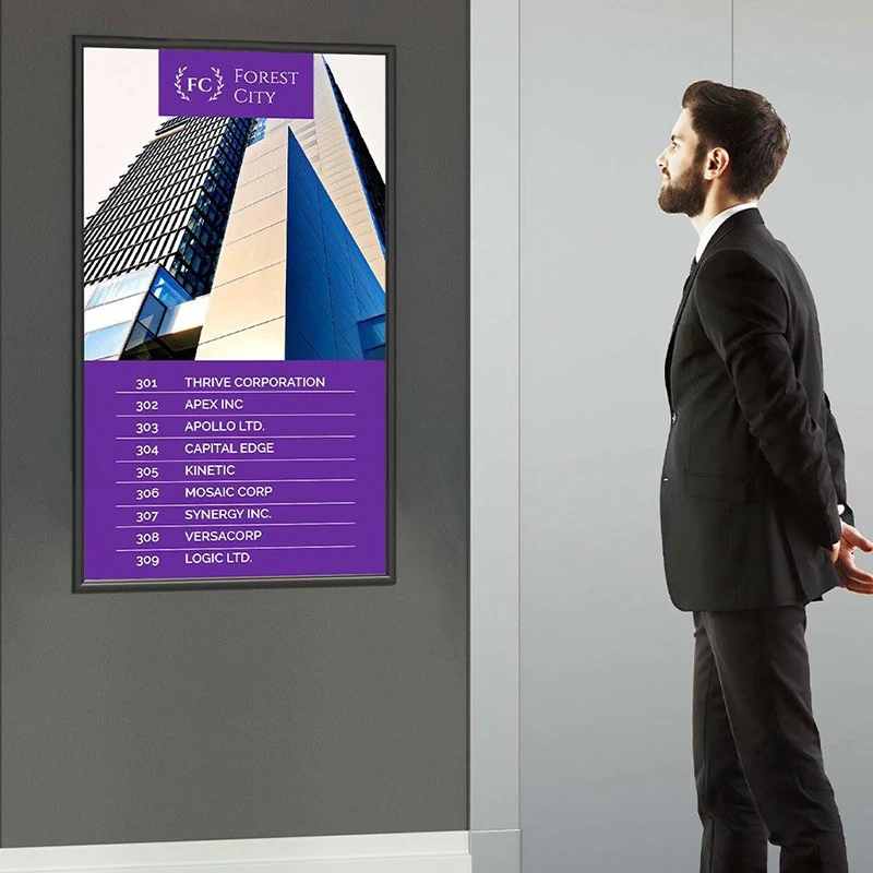 digital directory sign for Forest City buildings in an office lobby.