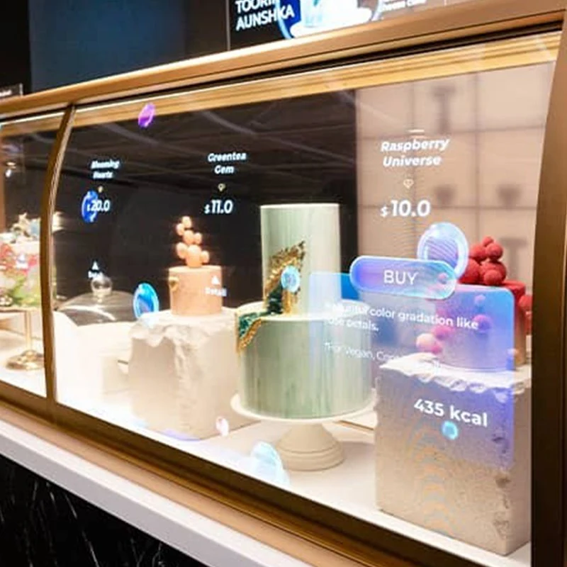 Smart bakery display case showing cake prices and nutritional info on glass