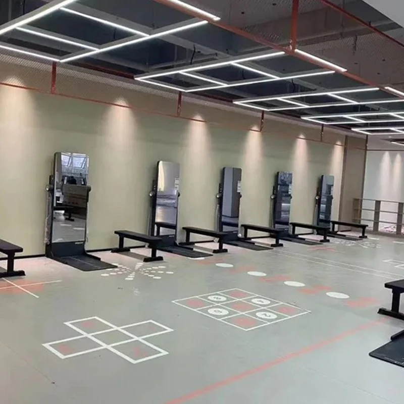 Multiple smart fitness mirrors in commercial gym studio